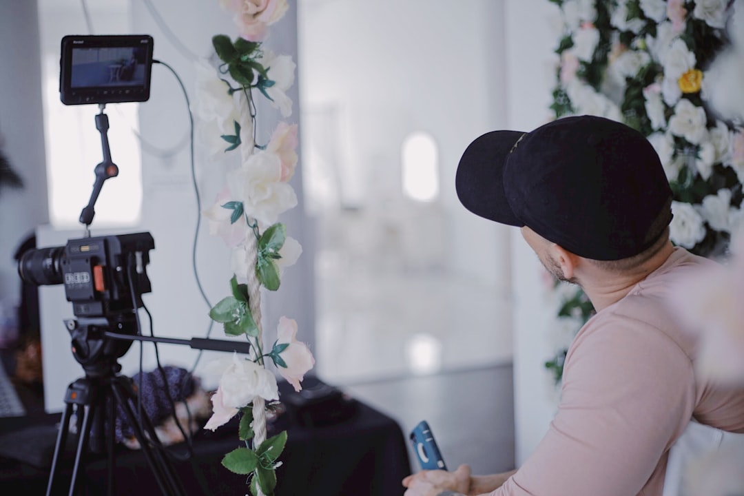 small business owner filming a video ad on a smartphone
